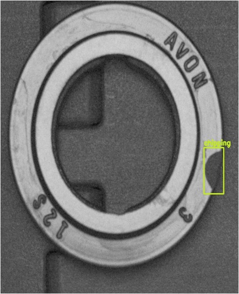 A bearing ring with a chipping defect boxed and named by an operator — the label that becomes training data